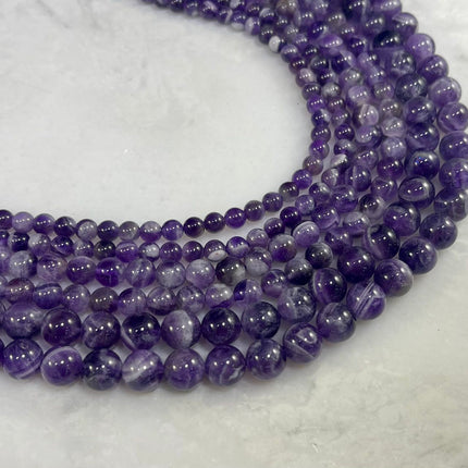 Dog Tooth Amethyst Round-1