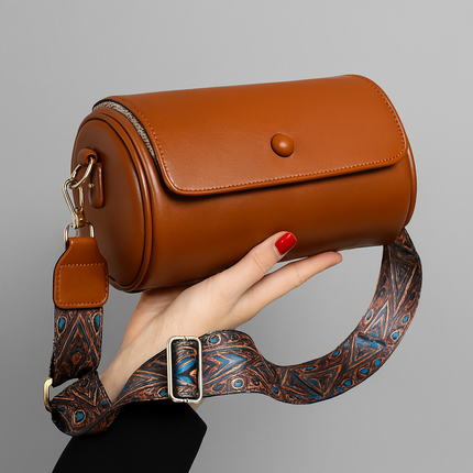 Tan Cylinder Bag with Artistic Strap Accent